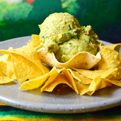 Fresh guacamole served with crisp tortilla chips